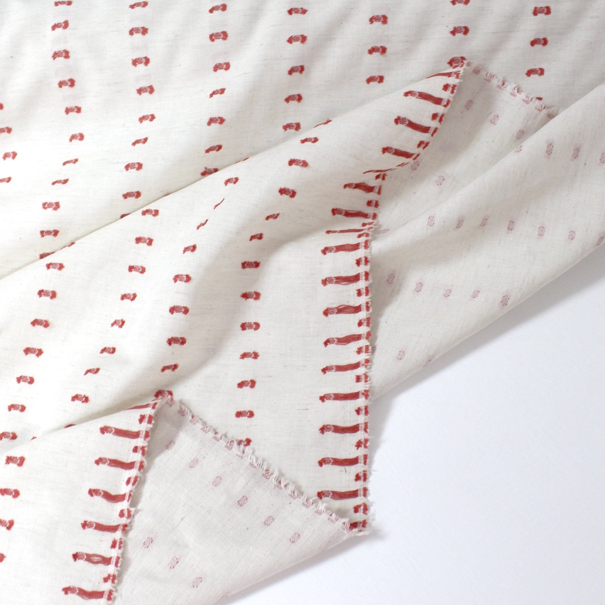 Italian "swiss dot" clipped weave linen blend - red